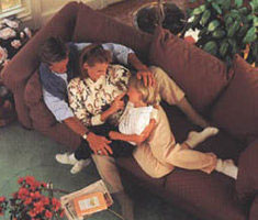 Happy family on a sofa