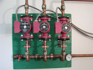 Use Individual pumps for each heating zone.